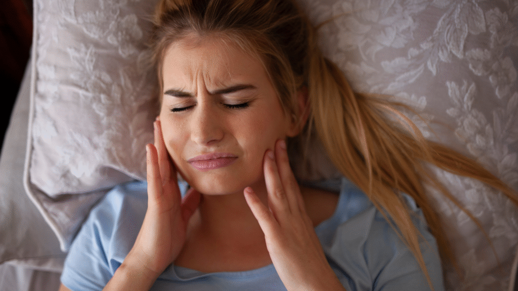 Bruxism: Overview, Causes, and Why Treatment Matters 1 - Professional Dental Woman grinding teeth in sleep (sleep bruxism).