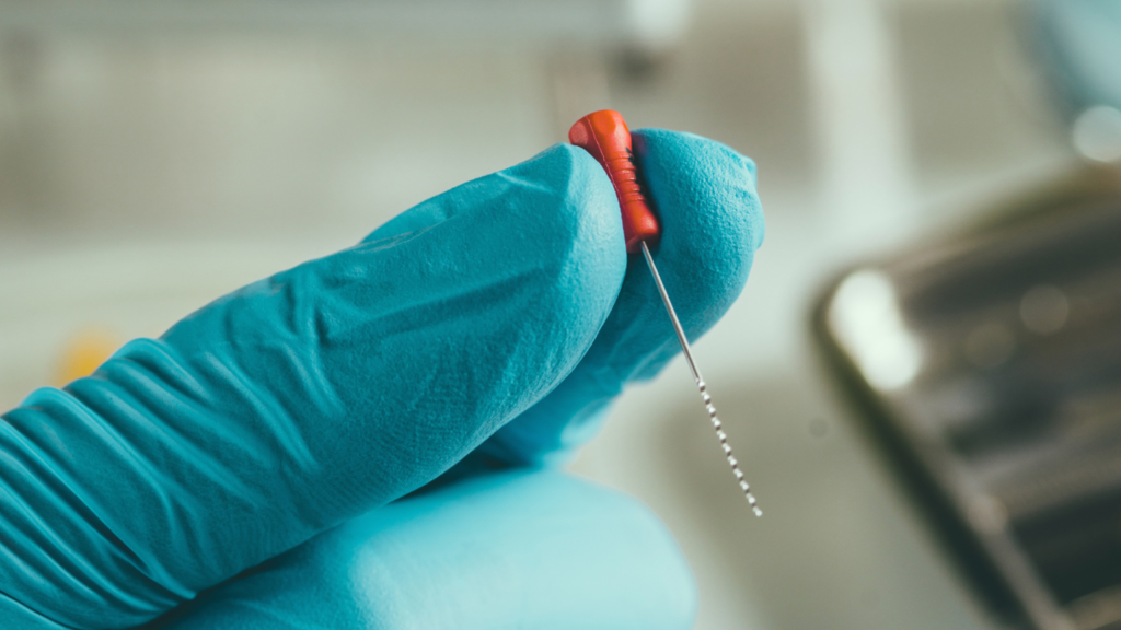 Do I Really Need a Root Canal? 7 Signs You Shouldn’t Ignore 1 - Professional Dental Dentist providing root canal treatment to a patient at Professional Dental in Utah